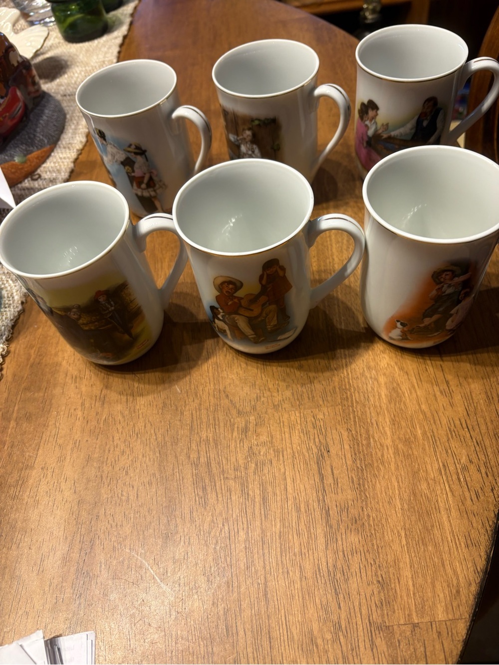 Set of 6 Decorative Porcelain Mugs with Figurative Scenes. Norman Rockwell